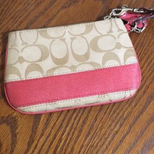 Small Pink and screen Coach Wristlet